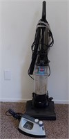 804 - STEAM IRON & BISSEL UPRIGHT VACUUM CLEANER