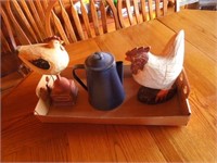 Wooden roosters & blue enamel coffee pot