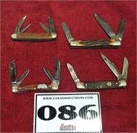 4 multi-bladed pocket knives