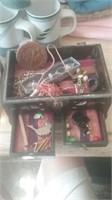 Asian style jewelry box with no lid full of