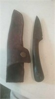 Smaller knife in leather tool case