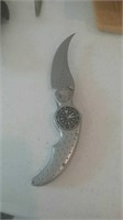 Folding stainless knife with built-in watch