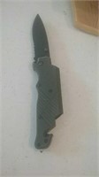 Folding hunting style knife with Black Blade and