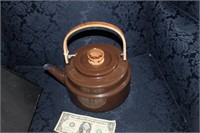 Brown enamelware kettle