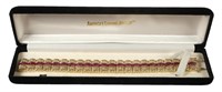 Lady's 14K Yellow Gold Ruby Fancy Tennis Bracelet