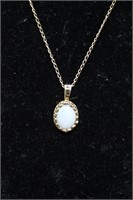 14kt necklace with opal pendant 15" L chain 1gtw
