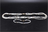 Three strand pearl ncecklace & pearl bracelet witk