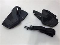 2 Pistol holsters unknown plus strap