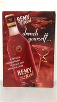 Remy red “drench yourself” martini tin sign.