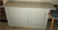 Wooden work station with sliding door storage