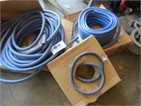 LOT OF BLUE AND BLACK RUBBER HOSE