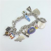 46.7g Sterling World Travel Bracelet & Charms