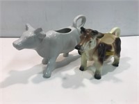 2 porcelain cow creamers.