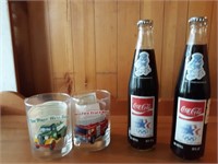 2 1980 Olympic coca cola full bottles and 2 Hess