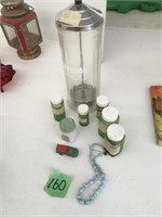 old medicine bottles, truck, necklace, cotton ball