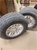 4 tires with wheels  fits dodge durango or dakota