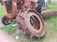 2 early1900s steel tractor wheels
