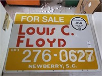 metal Realty sign