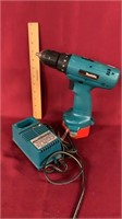 Makita drill with charger