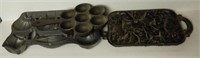 Lot #1414 - (3) cast iron cooking molds