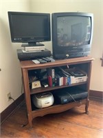 tv console, 2 tvs, stereo, 2 VCRs,  VHS, clock