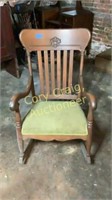 Oak rocker carved back and cushion seat