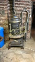 Round Oak number 18 coal stove 68 inches tall