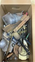 Box of primitive kitchen utensils