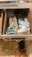 Items in drawers in kitchen