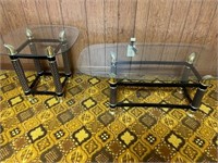 2 matching glass top tables