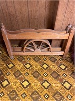 Antique wooden wagon wheel bed with spring frame