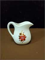 McCoy pitcher with flower decor approx 6 inches