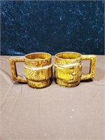 Pair of McCoy belt buckle mugs