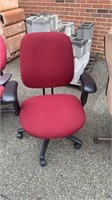 2 maroon desk chairs different sizes