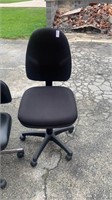 2 black office chairs different sizes