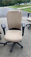 2 tan office chairs