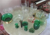 Large group of glassware including green vases,