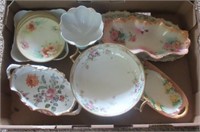 Group of vintage dishes including saucers, bowls,