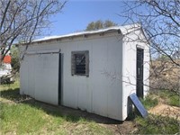 Portable building on skids, approx 10x18’, wired