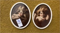 Pair of oval framed cherub pictures 6-1/2” high