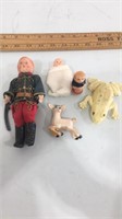 Lot of 5 plastic figurines.  The larger soldier