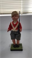 Soldier boy with rifle doll