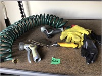 garden hose, water sprayers, gloves