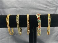 5 Gold Colored Bracelets. Choo Choo Train