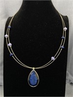 Stunning Navy Blue Stone Cased in Silver on Silver