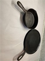 Cast iron griddle top and skillet