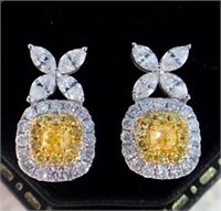 0.8ct natural yellow diamond earrings in 18k gold