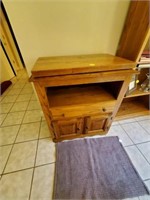OAK CABINET WITH TURN TABLE TOP
