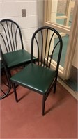 8 metal chairs with nice green cushion