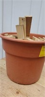 Plastic planter with wood pieces